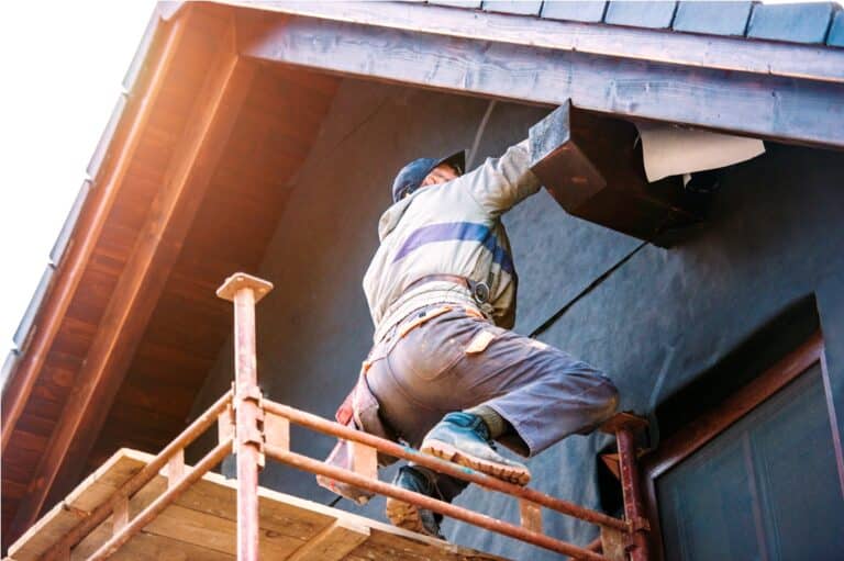construction worker thermally insulating house wit 2022 02 08 22 38 01 utc
