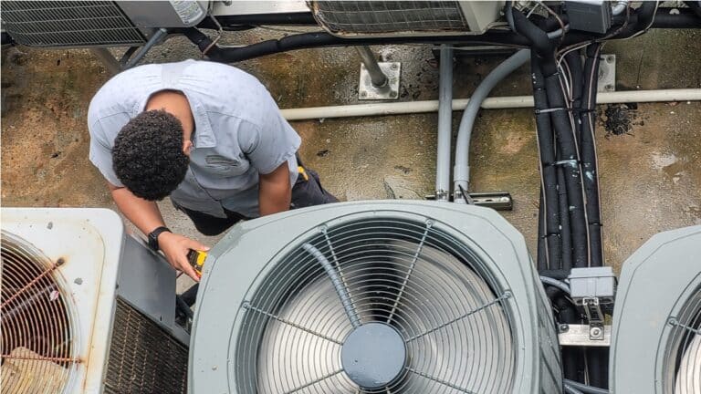 young hvac technician millennial has modern equipm 2022 11 12 10 47 47 utc