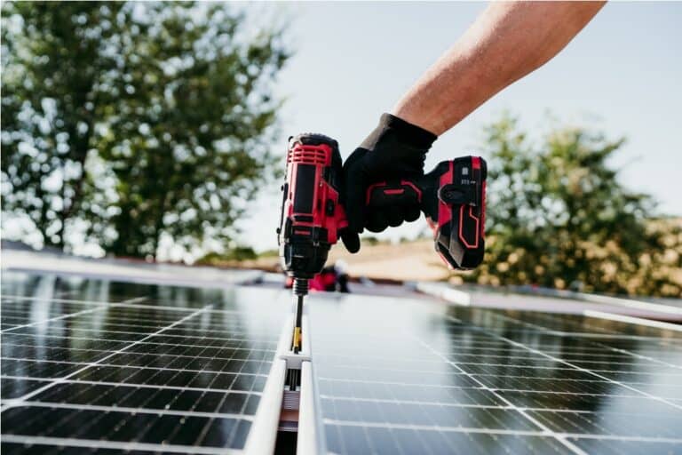hand of technician assembling solar panels with dr 2022 10 11 20 20 48 utc