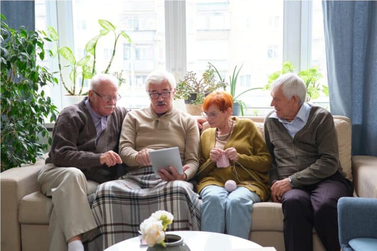 elderly friends using tablet pc together 2023 11 27 05 35 05 utc